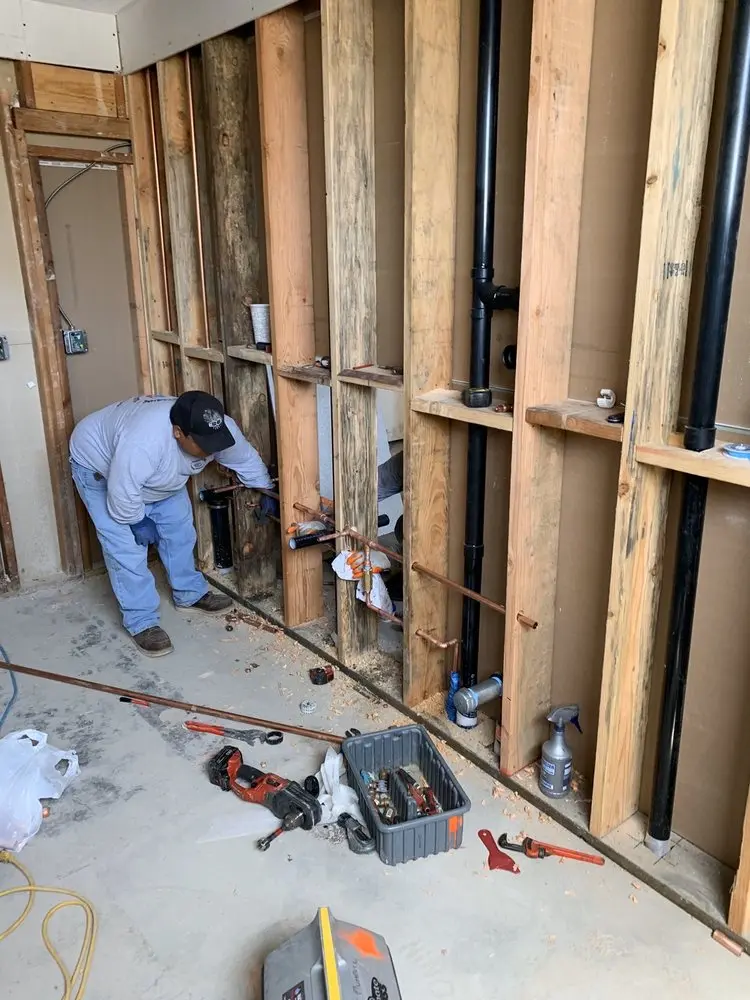 Commercial rough-in plumbing for Water Heater Replacement in Stansbury Park